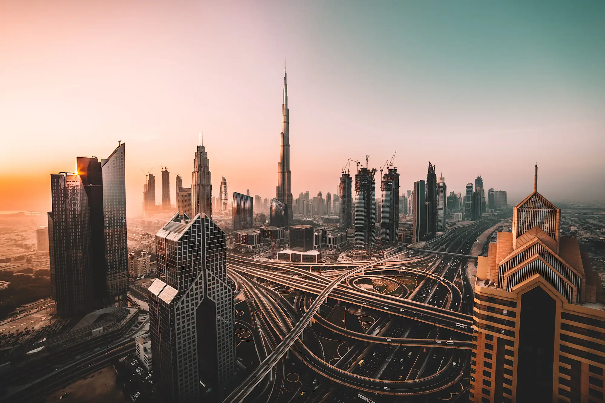 Downtown Dubai skyline at dawn with the Burj Khalifa